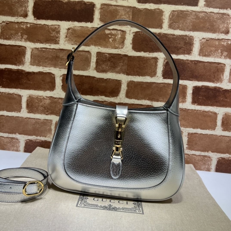 G*u*i top handle bags